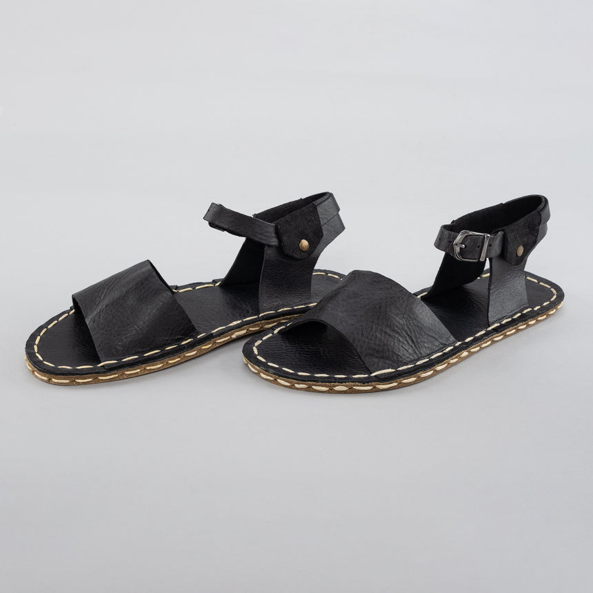 Schwarze Barfußsandalen mit offener Spitze