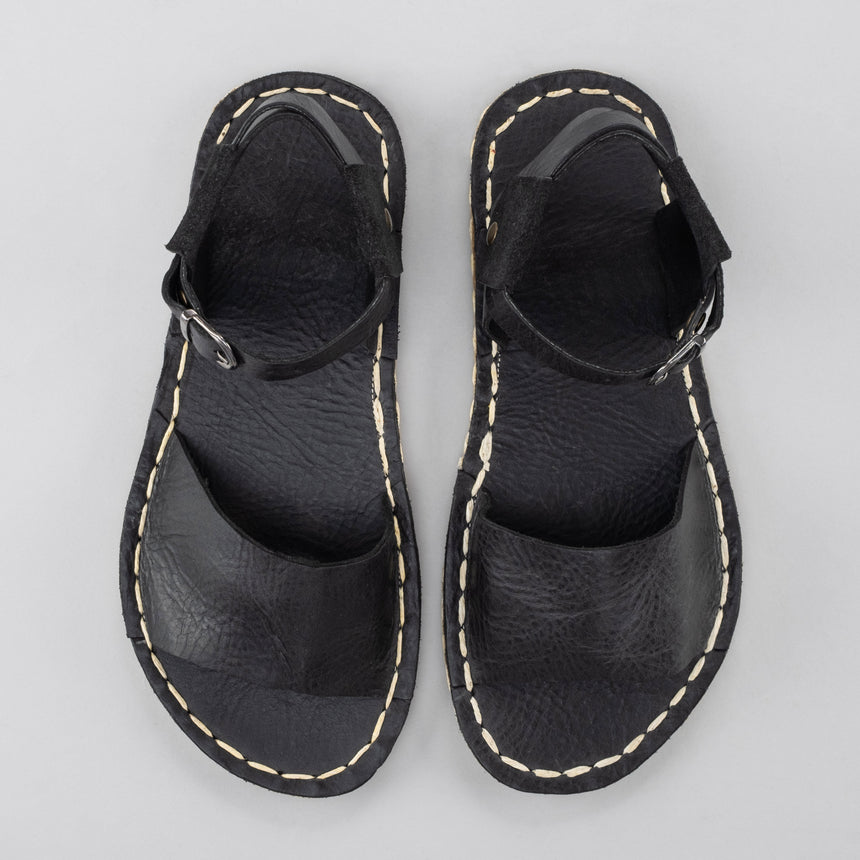 Schwarze Barfußsandalen mit offener Spitze