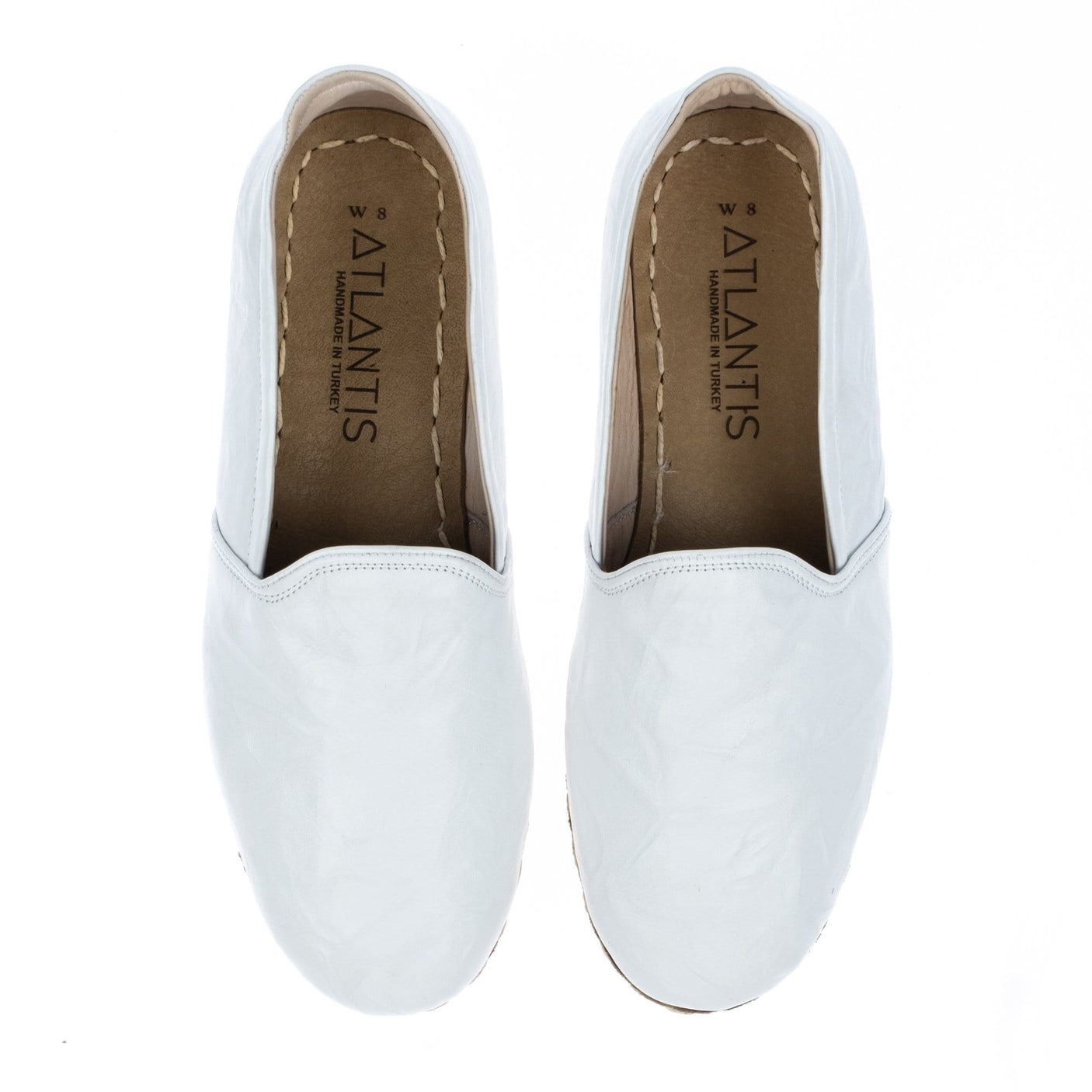 Faltige weiße Slip-On-Schuhe für Damen