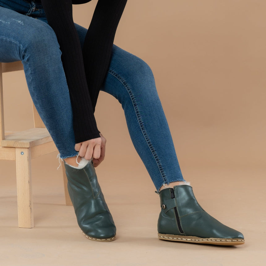 Grüne Lammfellstiefel für Damen